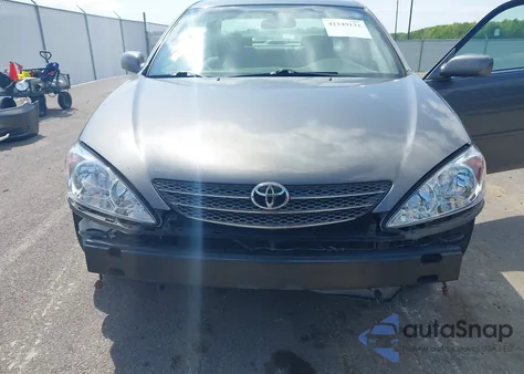 2003 Toyota Camry Le z USA, uszkodzony, nr VIN 4T1BE32K13U669963
